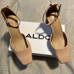 Like new Aldo nude size 7 shoes. Only worn indoors for photo shoot.
